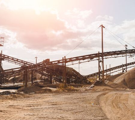 A crusher at a mining facility utilizes custom crusher parts.