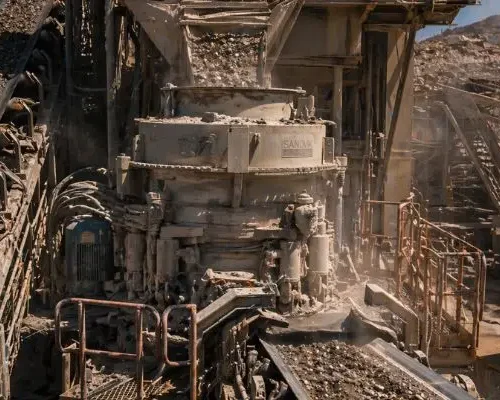 Cone crusher operating in quarry with material flow during troubleshooting and performance inspection