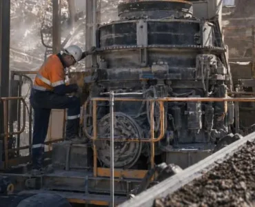 full machine crusher engineering support Technician performing maintenance with full machine crusher engineering support on cone crusher at mining site